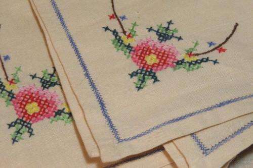 Four small embroidered napkins - cross stitch