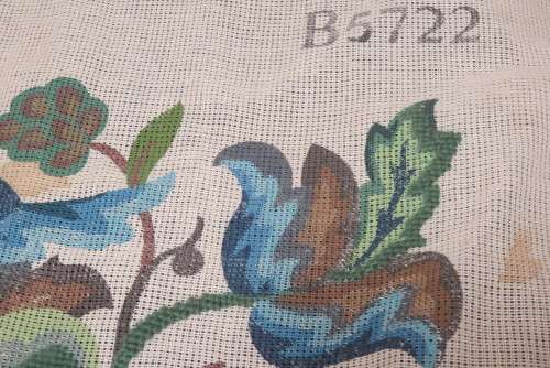 Partially completed tapestry with wools