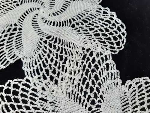 2 white acrylic doilies 27cm