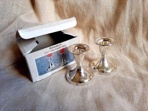 Pair of small silver plated candlestick holders - 7cm high