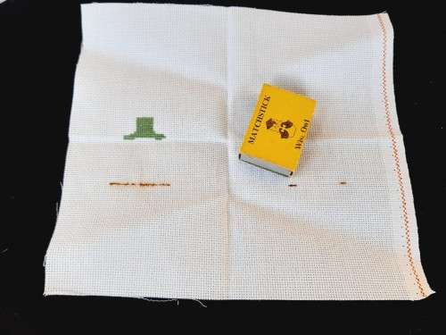 Pieces of cross stitch canvas