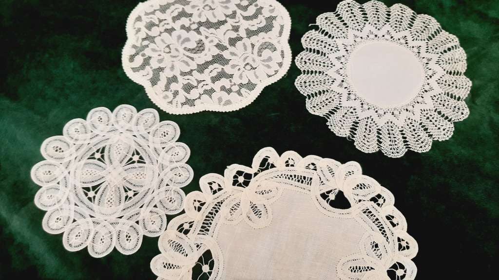 Four delicate doilies -  15, 18, 20 and  23cm