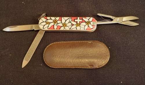 Victorinox Swiss Army Knife . Classic Edelweiss Flowers logo 58 mm with pouch