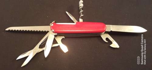 Victorinox - Huntsman Plus with Red Scales Good Condition Discontinued
