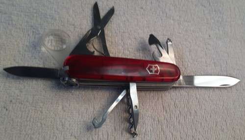 Victorinox -Explorer with red Translucent Scales tools as per pictures