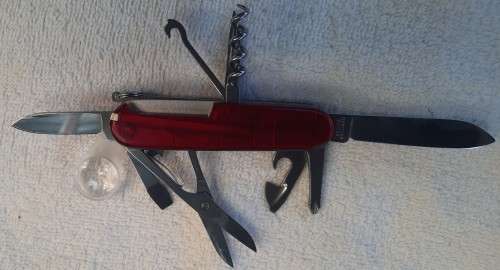 Victorinox -Explorer with red Translucent Scales tools as per pictures