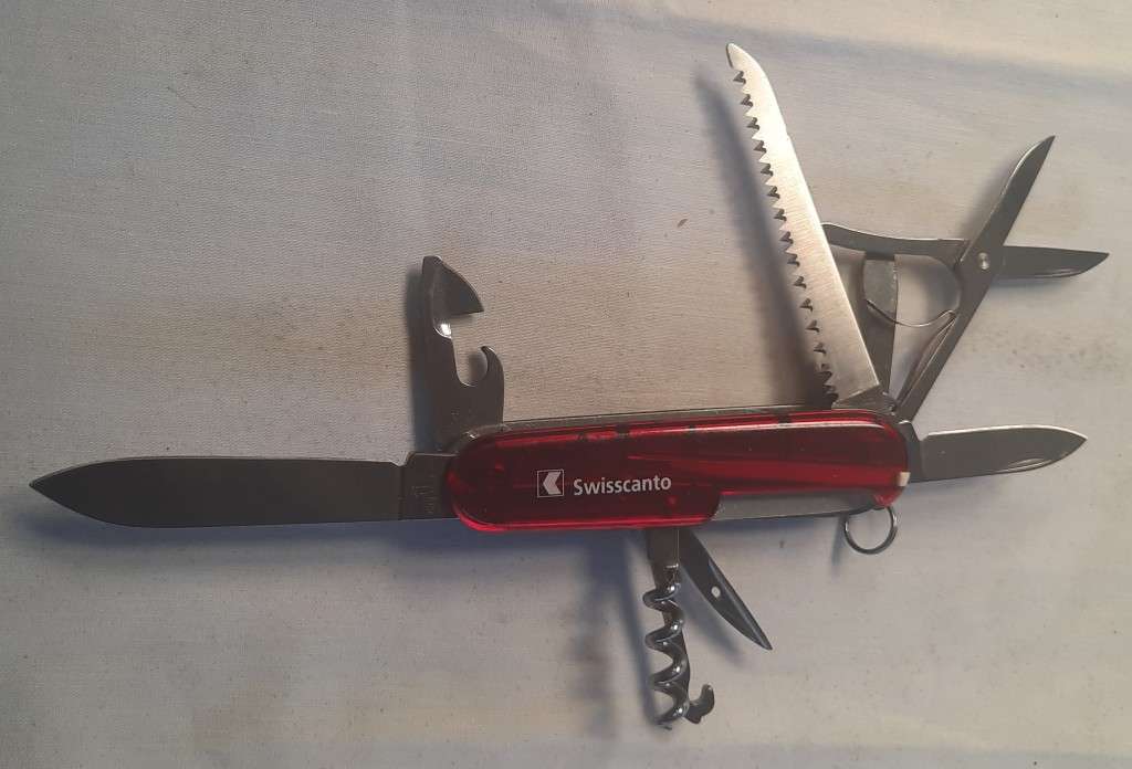 Victorinox Swiss Army knife (Huntsman) model Red Transl scales Swisscanto Logo on scale