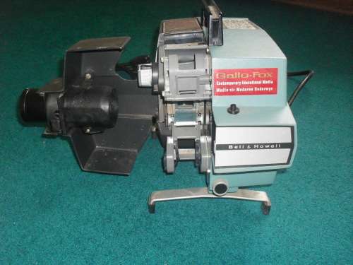 BUYER TO COLLECT IN PRETORIA - "BELL AND HOWELL" FILM STRIP PROJECTOR - WORKING!