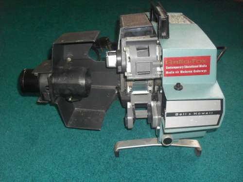 BUYER TO COLLECT IN PRETORIA - "BELL AND HOWELL" FILM STRIP PROJECTOR - WORKING!