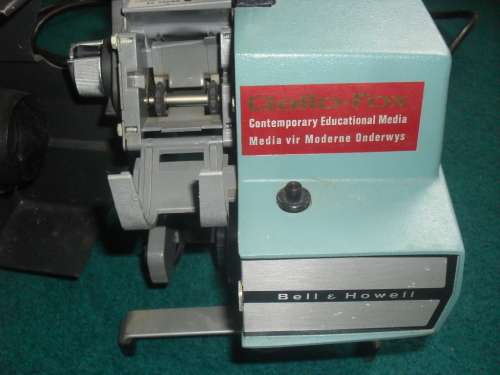 BUYER TO COLLECT IN PRETORIA - "BELL AND HOWELL" FILM STRIP PROJECTOR - WORKING!