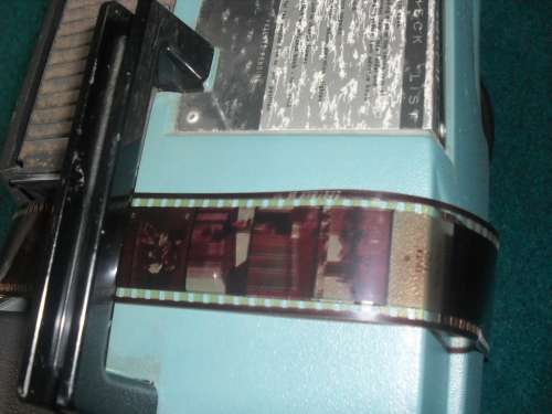 BUYER TO COLLECT IN PRETORIA - "BELL AND HOWELL" FILM STRIP PROJECTOR - WORKING!