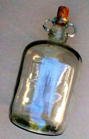 LARGE 1950's FRUIT JUICE BOTTLE - 32cm HIGH AND 16cm IN DIAMETER.