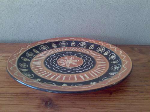 Karyn Pepper Large round ceramic platter with african theme