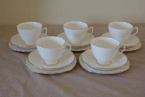 FIVE STUNNING ROYAL MALVERN (ROYAL DOULTON) "CLASSIC WHITE" PATTERN BONE CHINA TRIO'S bid/trio