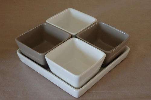 AN AWESOME FIVE PIECE CERAMIC "CRUET" SET WITH FOUR BOWLS AND A PLATE IN FANTASTIC CONDITION