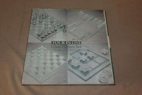 A FANTASTIC GLASS 4-IN-1 BOARD GAME SET THAT INCLUDES CHESS, CHECKERS, BACKGAMMON AND TIC-TAC-TOE