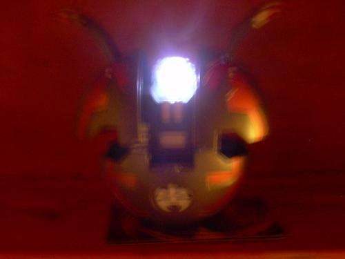 BAKUGAN BALL WITH LIGHT THAT COMES ON WHEN IT OPENS!