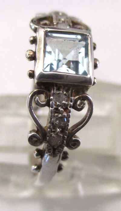 Genuine Diamonds & Blue Topaz Ring in Sterling Silver