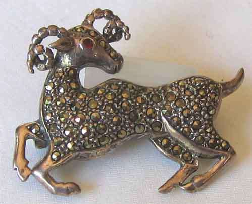 925 Sterling Silver, Marcasite & Garnet Brooch.