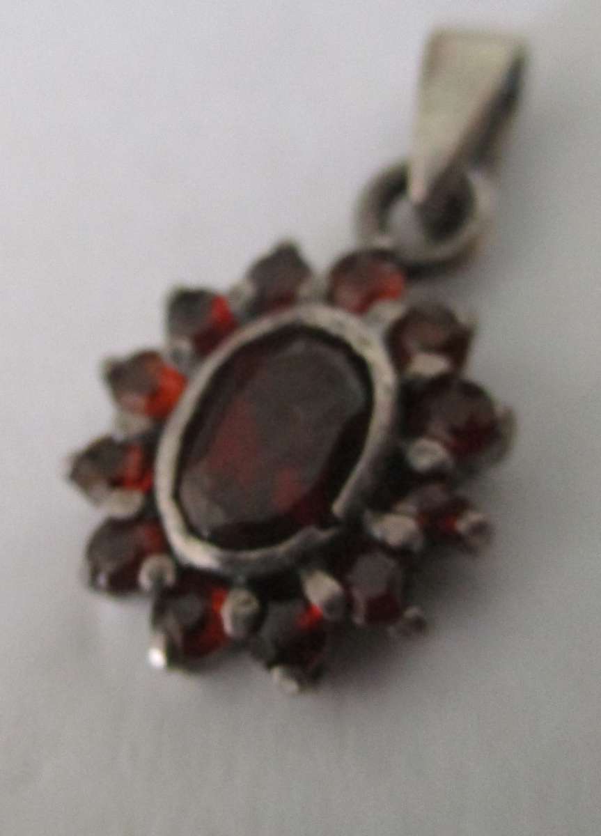 925 Sterling Silver and Garnets Pendant
