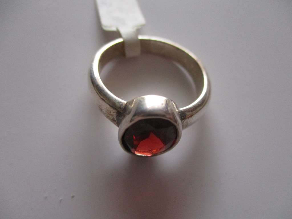 Solitaire , Sterling Silver and  Genuine Garnet  Ring.