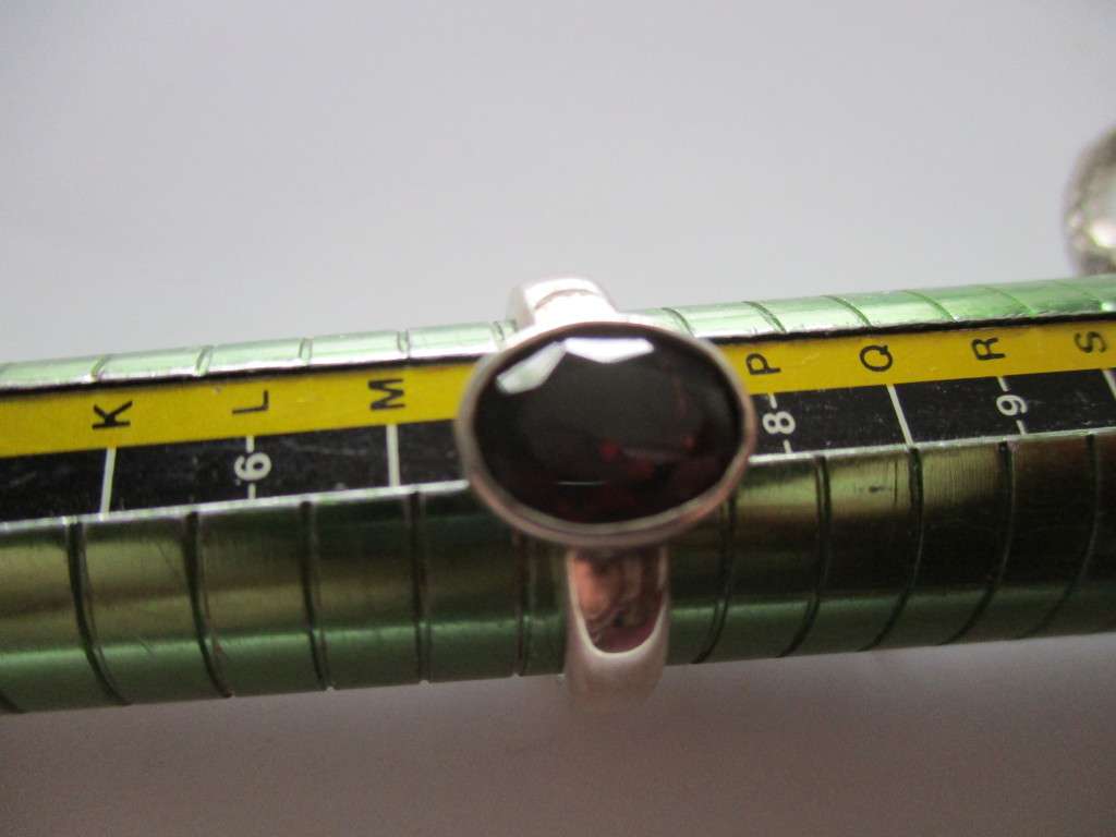 Solitaire , Sterling Silver and  Genuine Garnet  Ring.