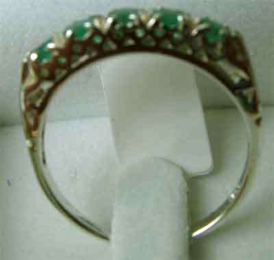 Elegant Sterling Silver and Emeralds Ring.