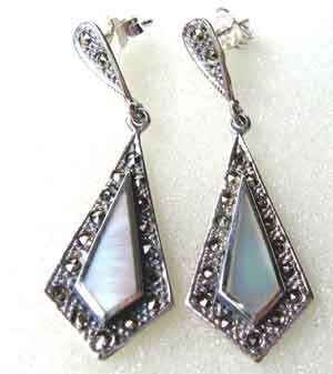 A pair of  Sterling Silver, MOP and Marcasite Earrings.