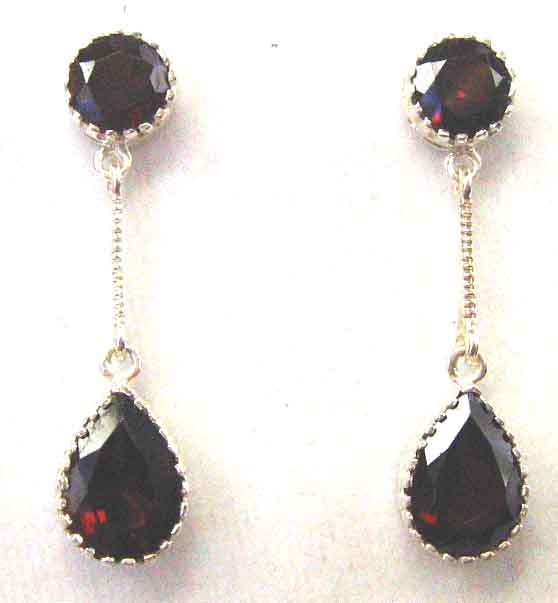 A Pair of  Sterling Silver and Genuine Garnets - Earrings