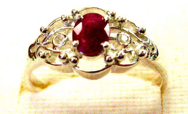 Stylish Sterling Silver , Genuine Ruby and Diamond Ring.