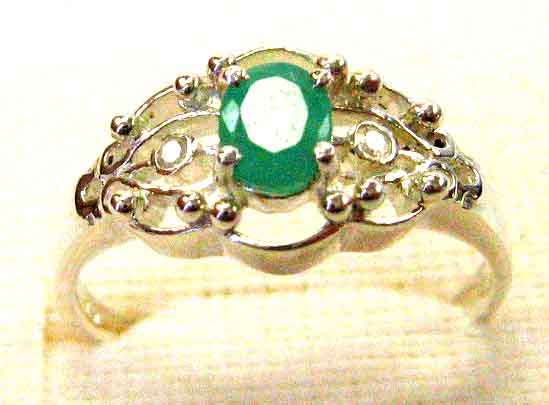 Stylish Sterling Silver , Genuine Emerald and Diamond Ring.