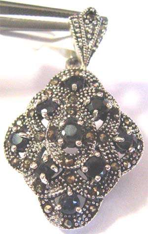 Sterling silver, Marcasite and Sapphires Pendant.