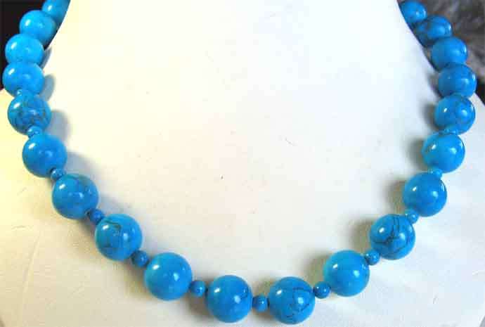 Necklace - 12.00mm Round Howlite with silver and turquoise clasp.