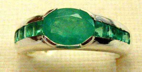 Beautiful Sterling Silver and Genuine Emeralds Ring .