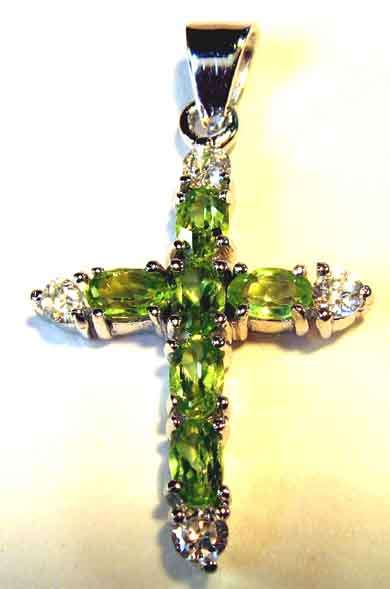 Genuine Peridot cross/ pendant in Sterling Silver.