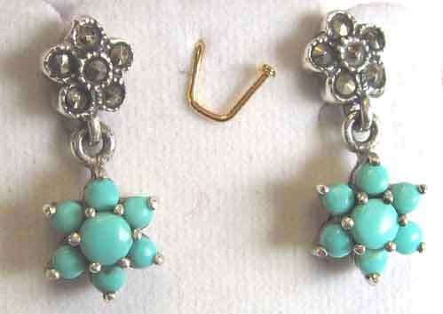 A pair of Sterling Silver and Turquoise Earrings.