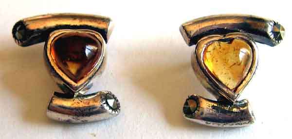 A pair of Sterling Silver and Amber Earrings.
