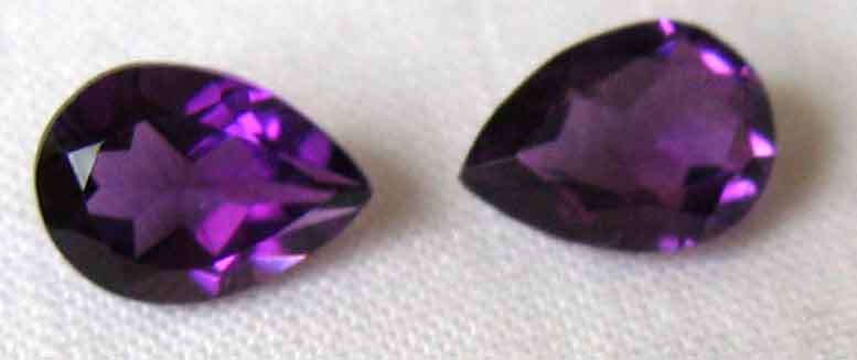 1 lot, 2 pieces  7.00 x 5.00 mm Pear faceted  cut  Amethysts , T. W. 1.24cts