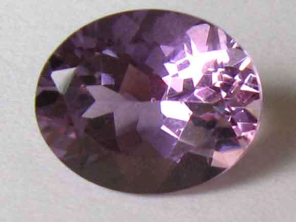 11.10 x 9.10 mm Oval -faceted cut Amethyst 3,39 cts,