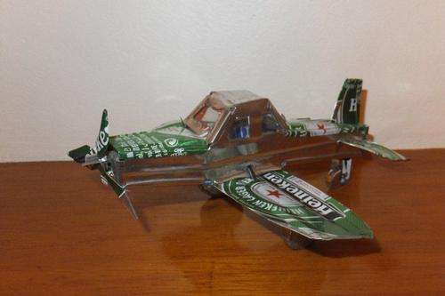 Scale model of Aeroplane fashioned out of Heineken Tin by a rural "engineer"!!