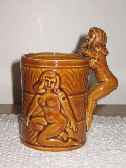Bare all mug bound to please!  With naked lady handle & detail.  Amusing & very cheeky