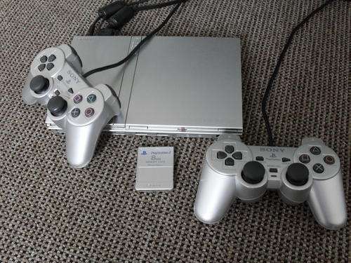 SONY PS2 SILVER SLIMLINE WITH GAMES