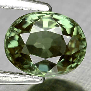 MINDBLOWING OVAL 1.39 CTs.GREEN SAPPHIRE