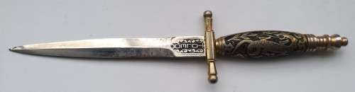 two collectable letter openers Toledo with dragon on handle and s steel made in Japan with knife