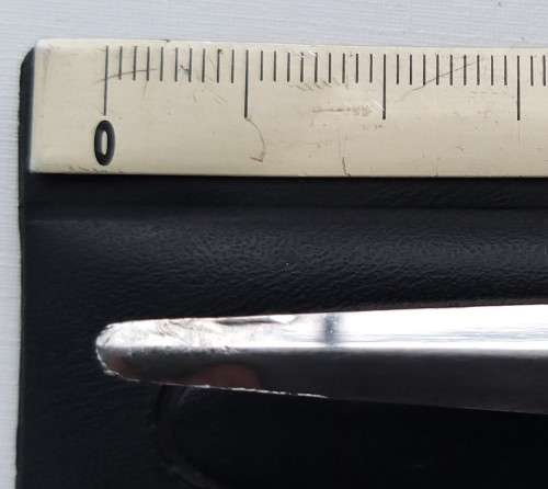 two collectable letter openers Toledo with dragon on handle and s steel made in Japan with knife