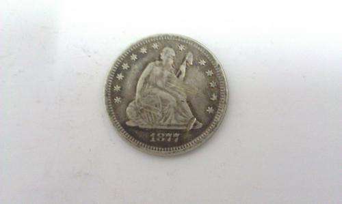 1877 USA QUARTER DOLLAR.....