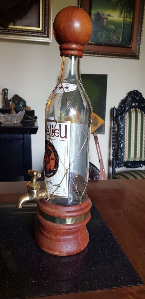 Richelieu Bottle on Tap with Wooden Features and  a Brass Tap