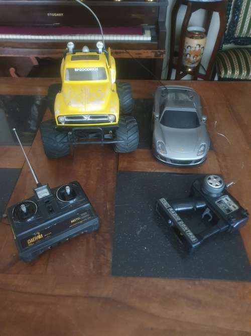 Two Rc Cars plus Remotes