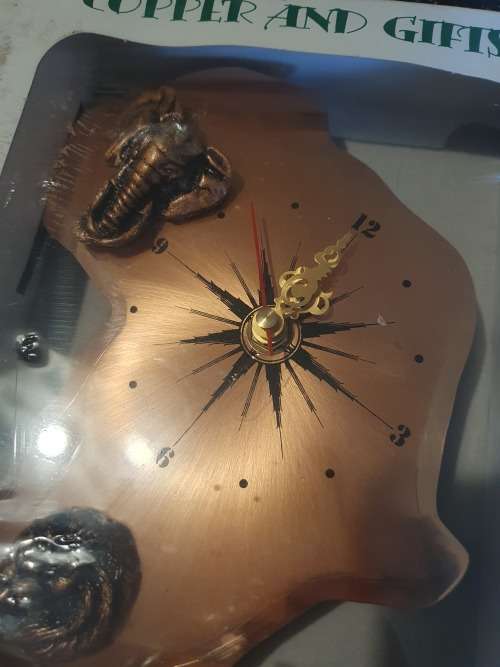 2 X Big Five Copper Clocks
