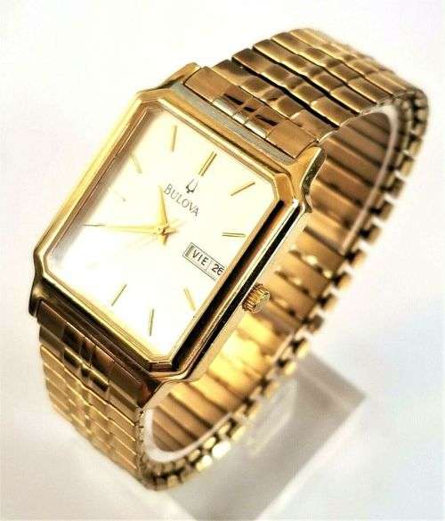 BULOVA GENTS AUTHENTIC GOLD TONE DATE WATCH WITH STRETCH BAND **ONLY ONE AVAILABLE